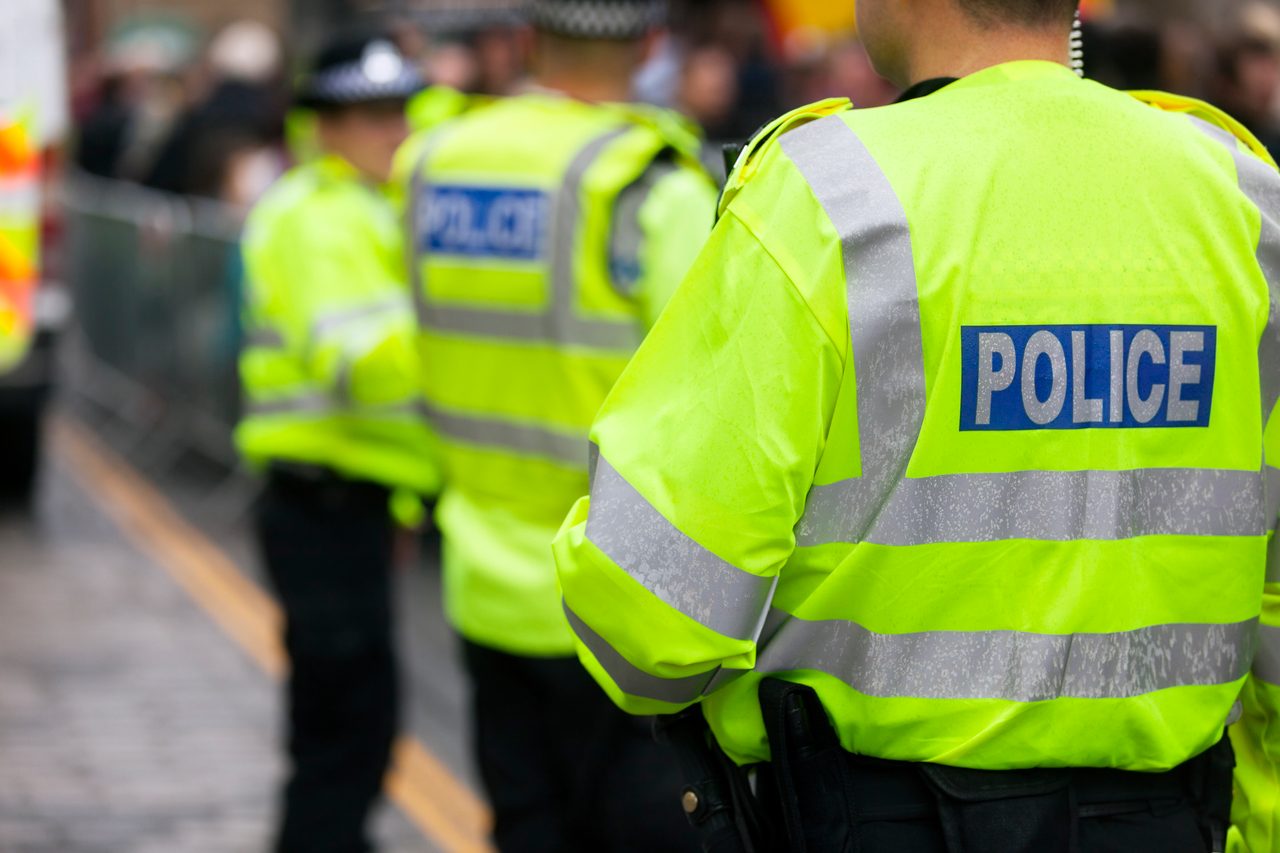 A stock image of police officers from behind