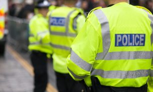 A stock image of police officers from behind