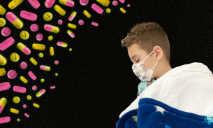 Chace sleeps in a hospital bed after contracting salmonella. The picture is overlaid with neon tablets and pills