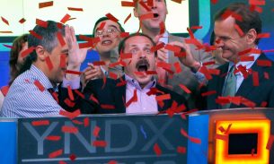 Yandex’s founder and CEO Arkady Volozh celebrates as the company is listed on the Nasdaq exchange in New York in 2011